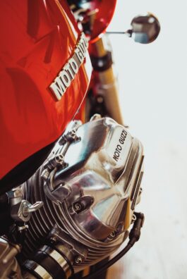 red and silver motorcycle engine